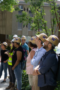 Volunteers viewing the construction of the the Population Health building.